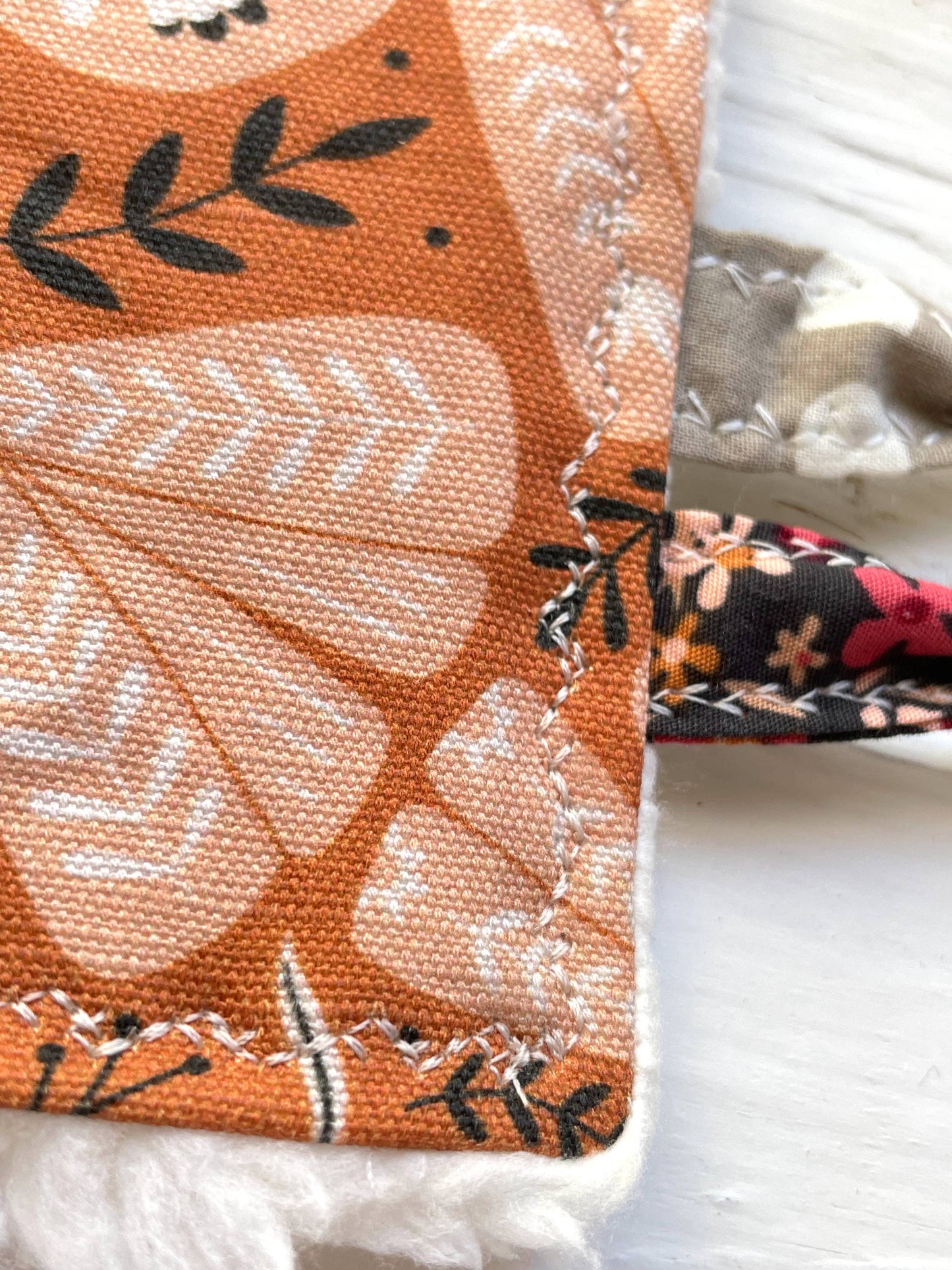 Folk Moth Canvas Crinkle Tag Toy Terra Cotta and Black