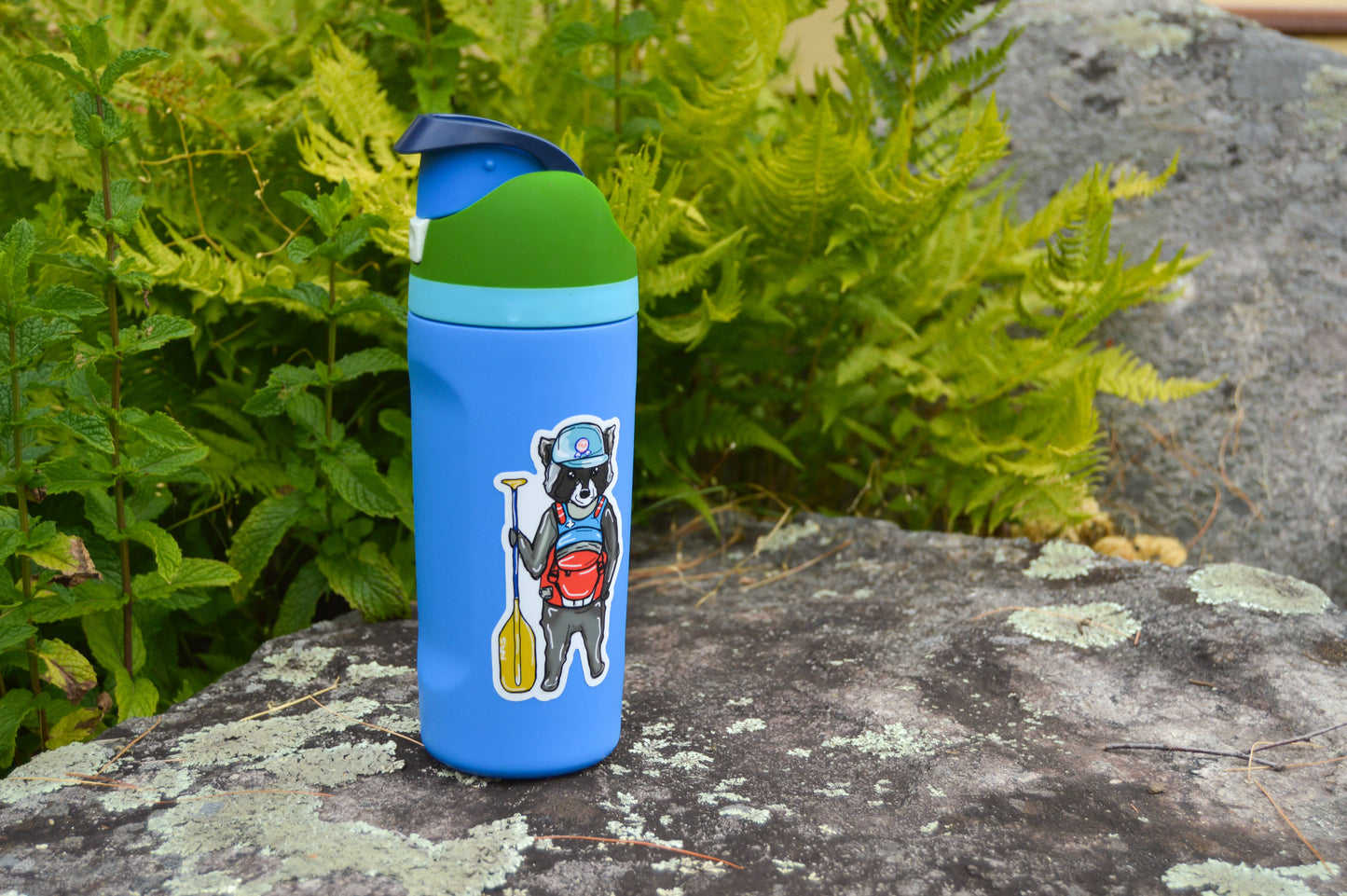 Paddleboarding Raccoon Sticker