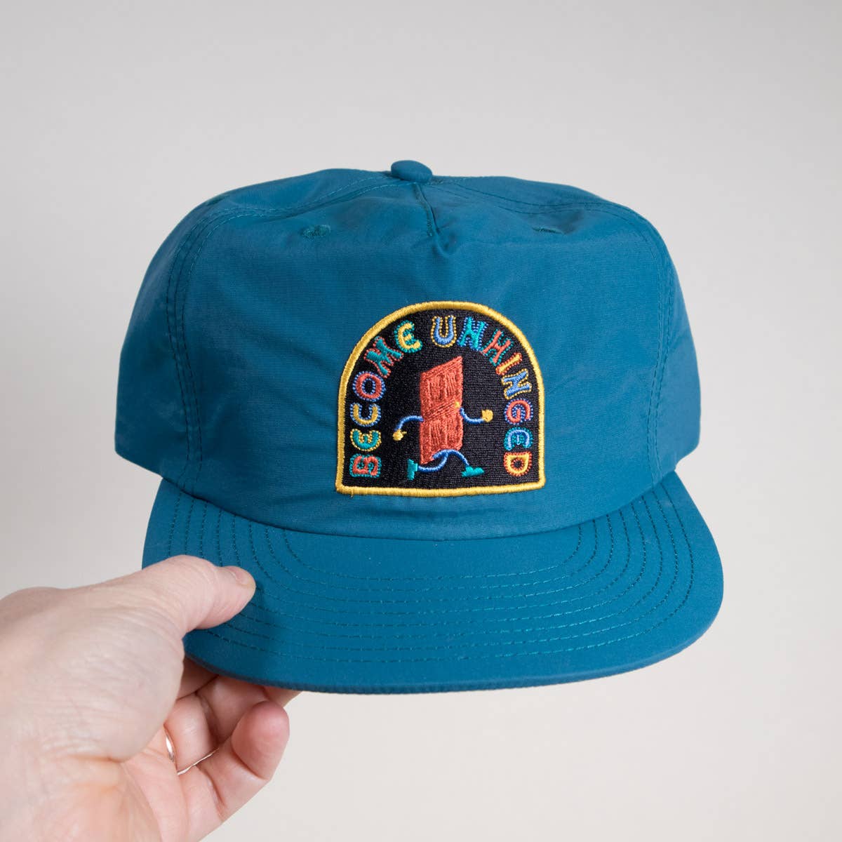 Become Unhinged Hat